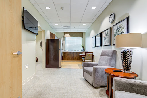 A modern waiting area featuring comfortable seating and tasteful decor.