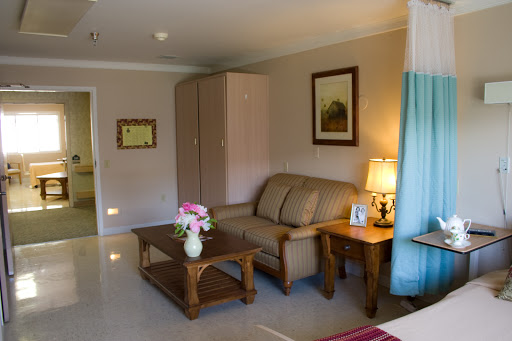 A cozy living room featuring a comfortable sofa, a stylish coffee table, and tasteful decor.