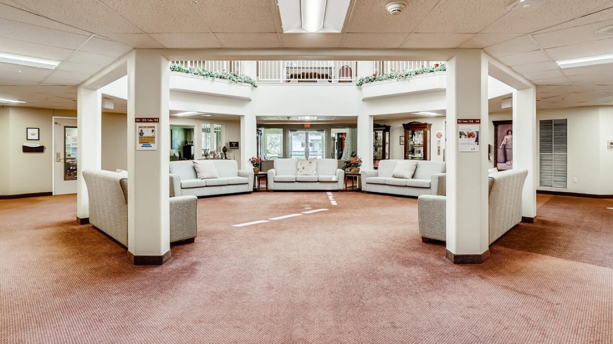 A spacious lobby with comfortable seating and ample natural light.