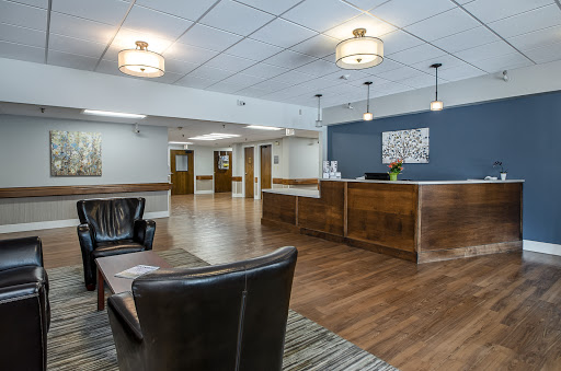 A welcoming reception area featuring modern design and comfortable seating.