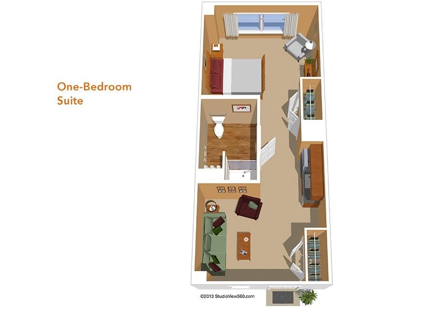 This image shows the floor plan of a one-bedroom suite, featuring a layout with a bedroom, bathroom, living room, and kitchen area.
