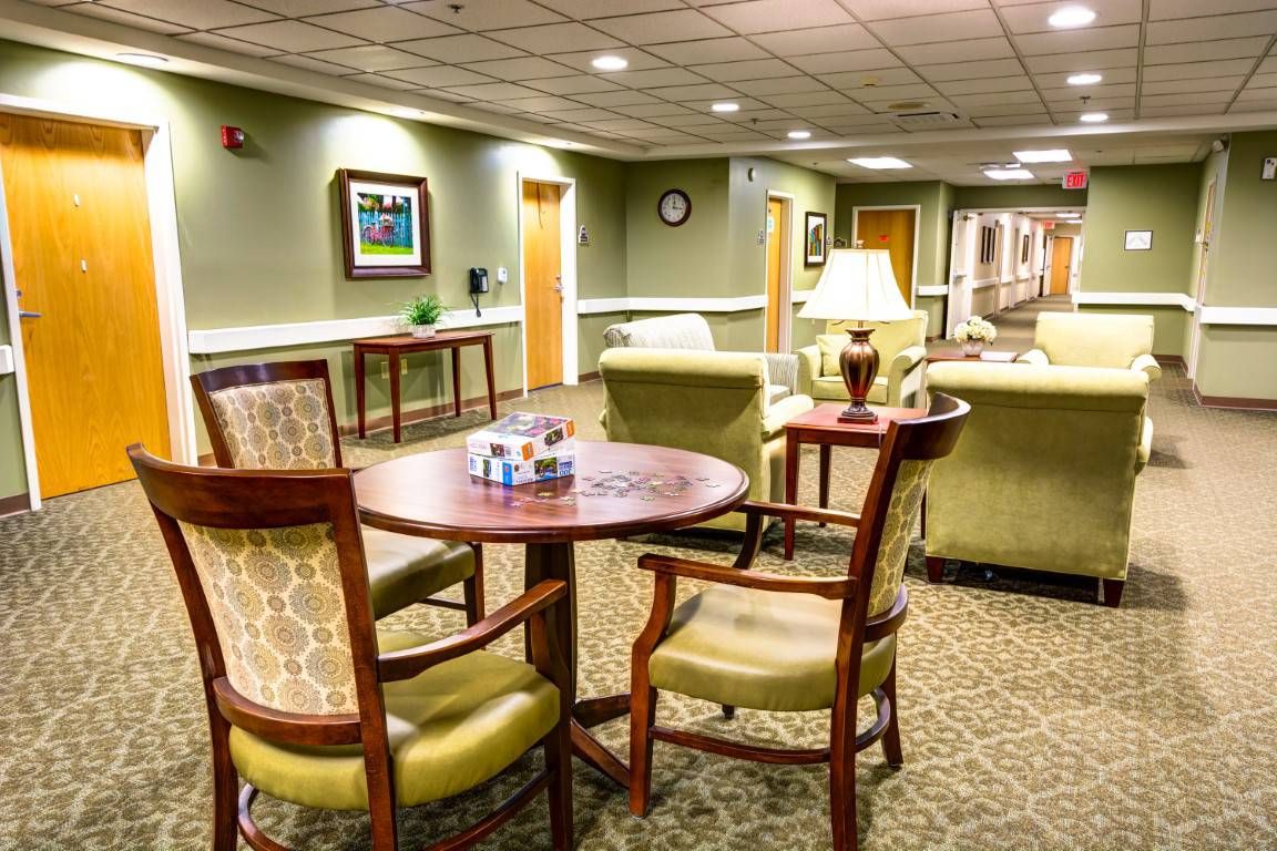 A cozy lounge area with comfortable seating and warm lighting.