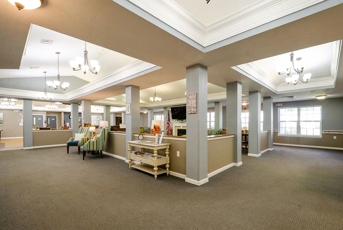 A spacious and well-lit lobby area with comfortable seating and elegant lighting.