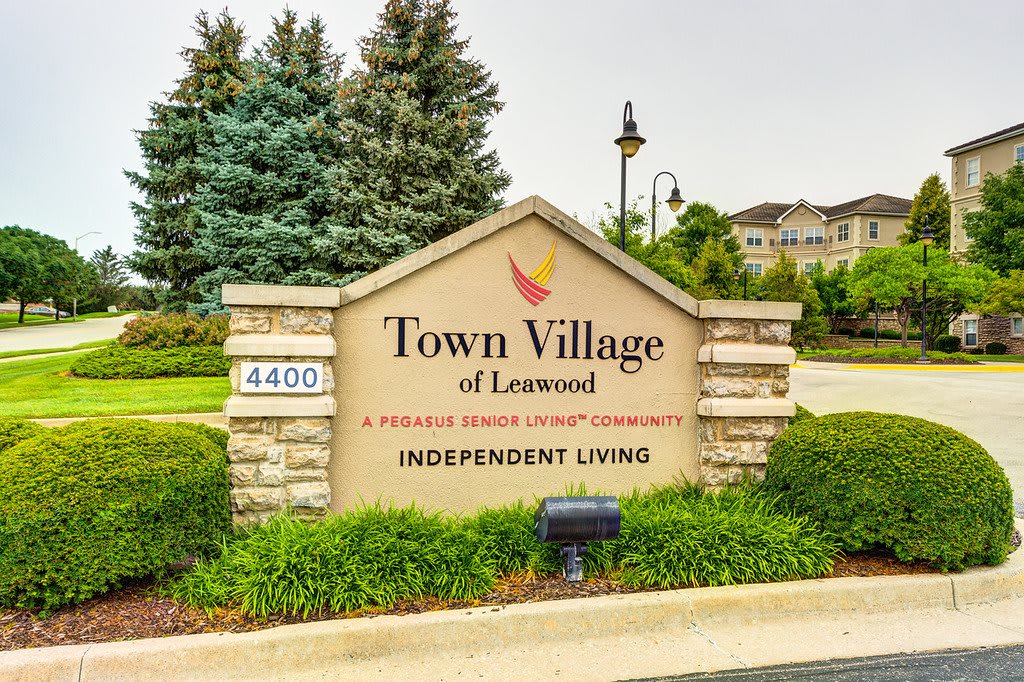 Entrance sign for Town Village of Leawood, an independent living retirement community.