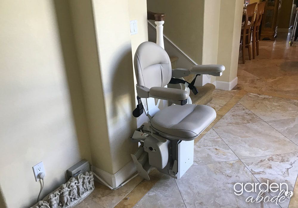 A stair lift installed in a home to assist with mobility.