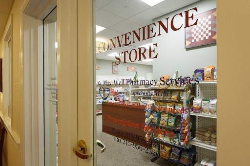 A view of a convenience store featuring snacks and pharmacy services.