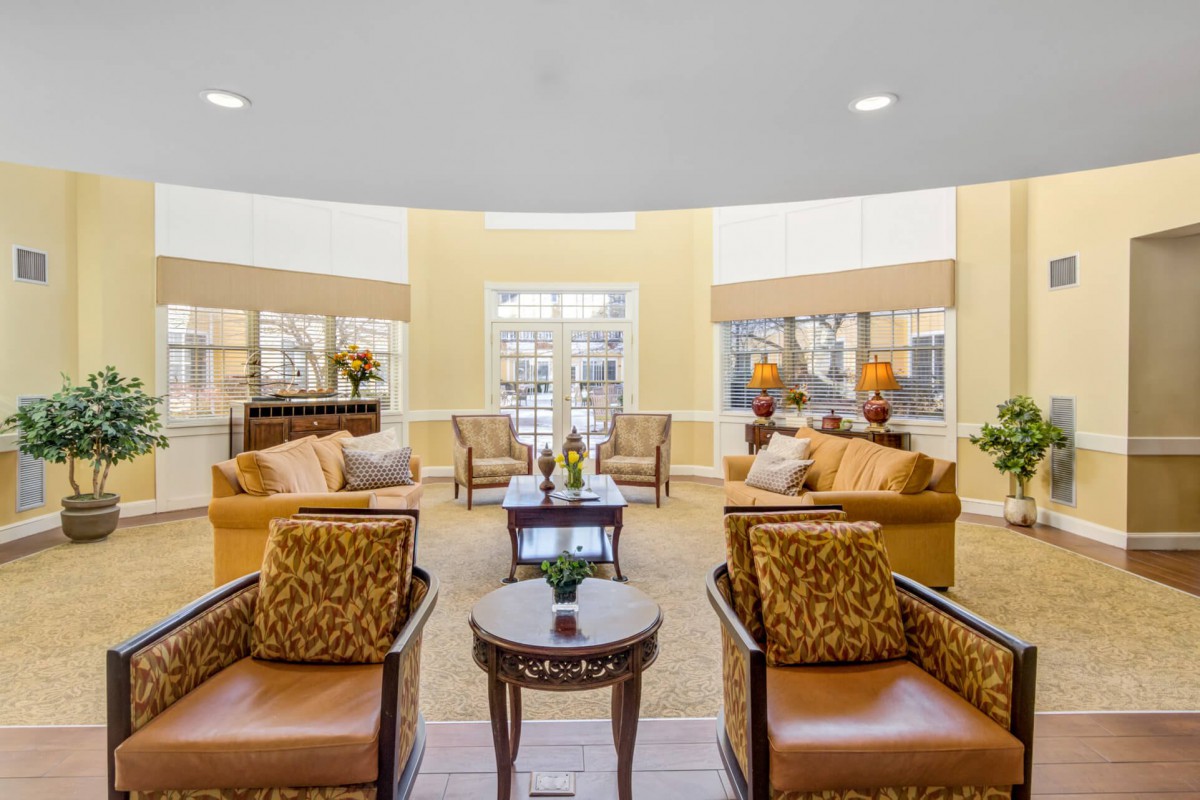 A cozy lobby area with comfortable seating and warm lighting.