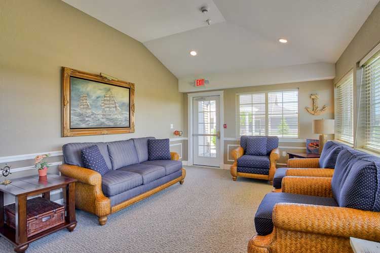 A cozy living room with stylish furniture and natural lighting.