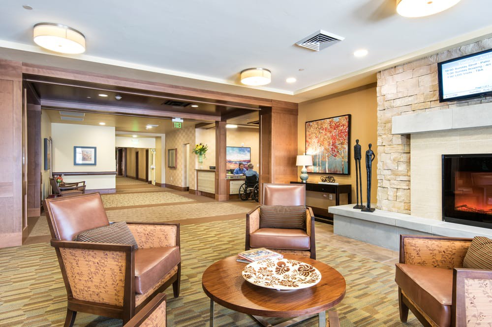 A modern lobby area featuring comfortable seating and stylish decor.