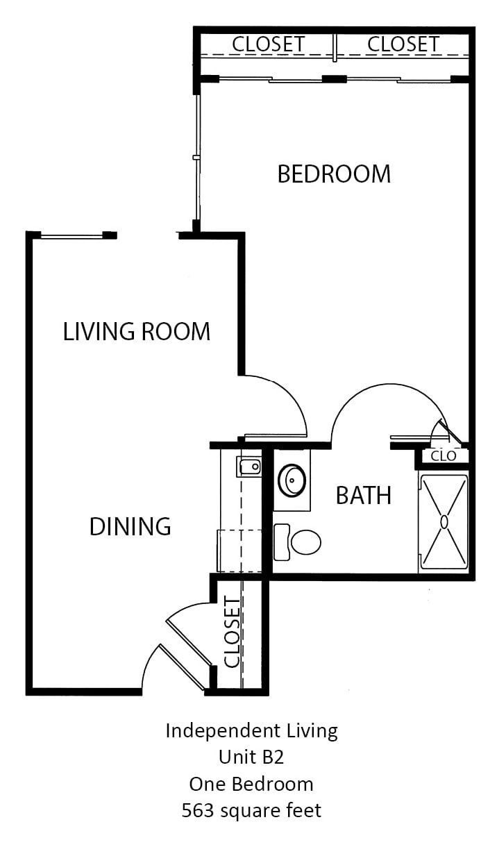 One-bedroom apartment floor plan with a living room, dining area, and bathroom.