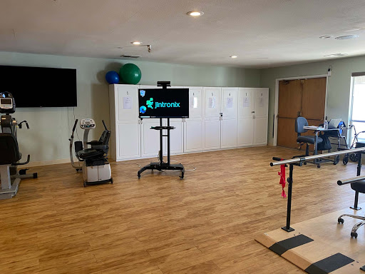 A well-equipped physical therapy room designed for rehabilitation exercises.