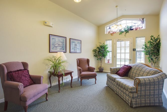 Cozy living room with comfortable seating and natural light.