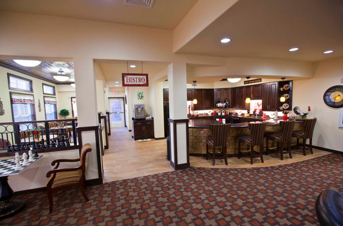 A welcoming lobby with a reception desk and seating area.