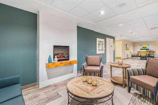 A cozy and modern living space featuring comfortable seating and stylish decor.