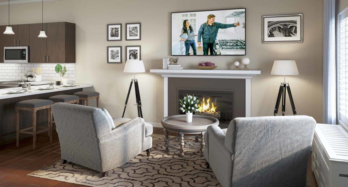 A cozy living room with a fireplace and television, featuring modern furniture and design elements.