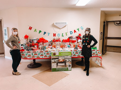 Celebrating the holidays with a festive display filled with gifts and cheerful decorations.