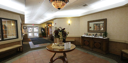 A welcoming hotel lobby featuring elegant decor and a spacious layout.