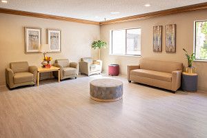 A modern living room with comfortable seating and tasteful decor.