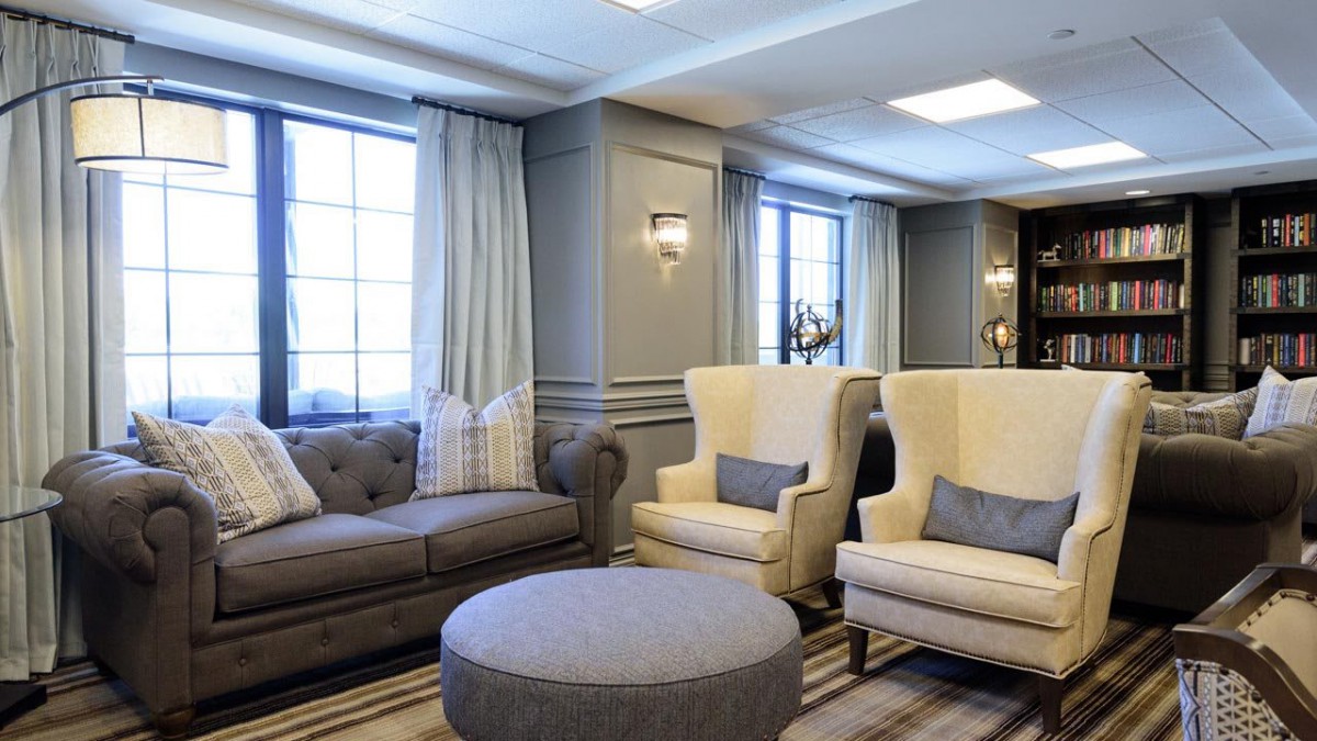 A cozy living room with stylish seating and natural light.