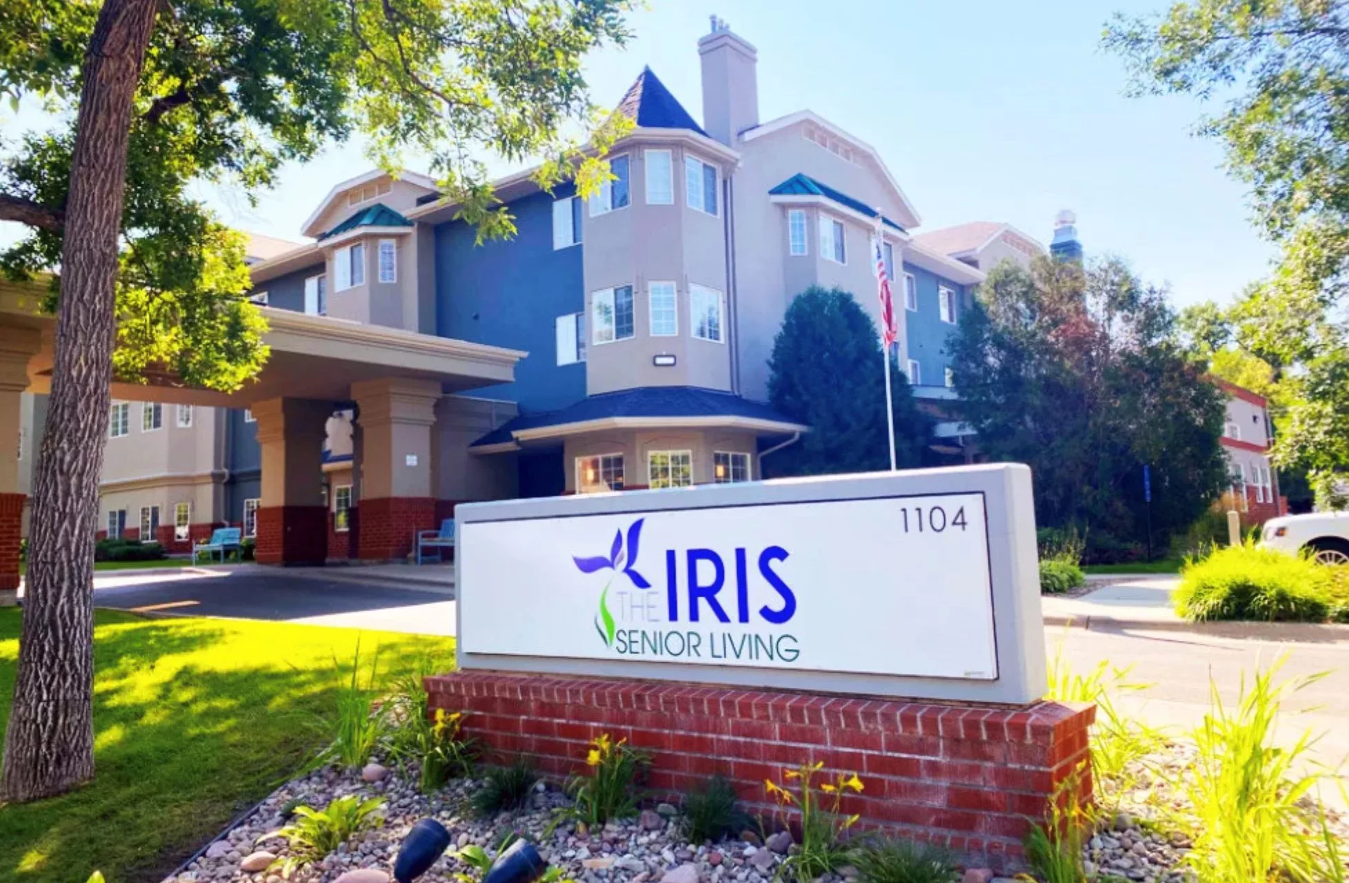 Exterior view of the Iris Health Services building with a prominent sign.