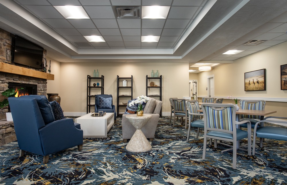 A modern living room with comfortable seating and stylish decor.