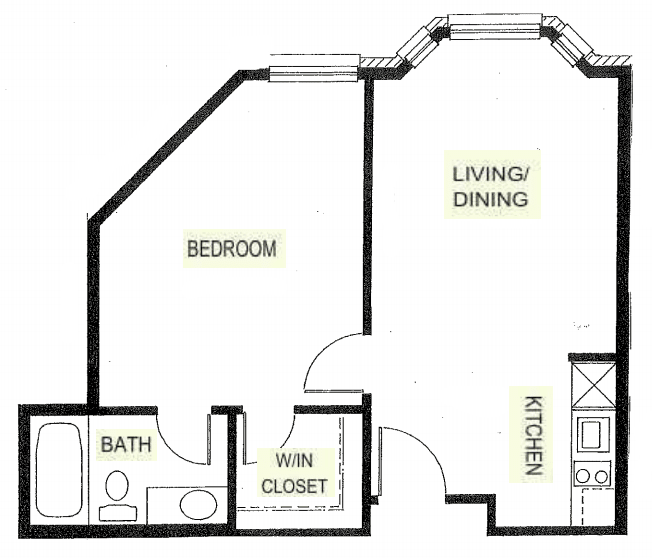 A floor plan of an apartment featuring a bedroom, bathroom, kitchen, and living/dining area.