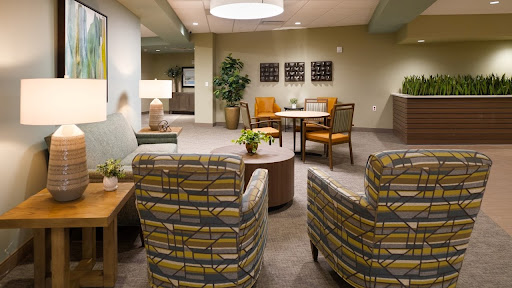 A cozy waiting area featuring comfortable seating and modern decor.