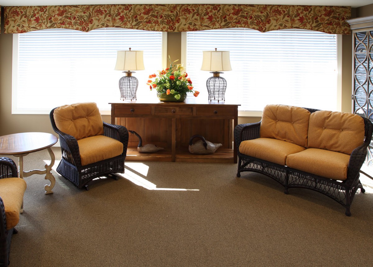 A cozy living room setup with comfortable seating and ambient lighting.