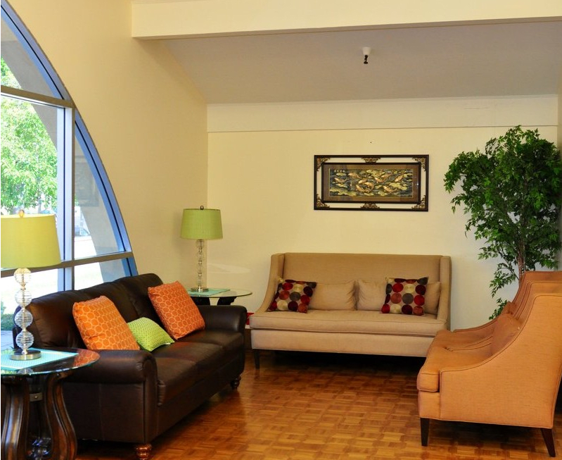 A cozy living room with comfortable seating and warm decor.