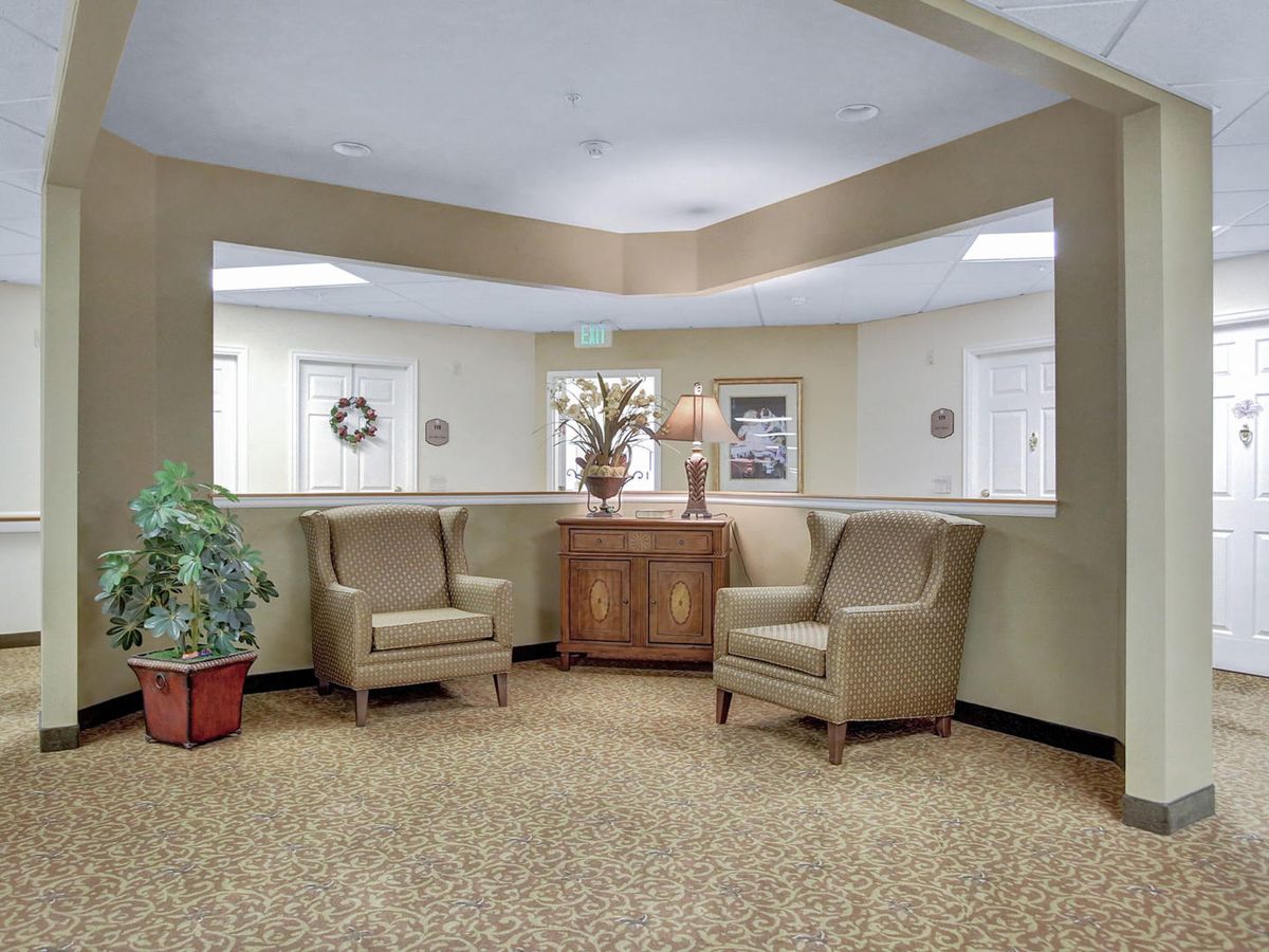 A cozy lobby area with comfortable chairs and elegant decor.