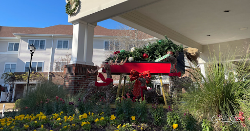 A beautifully decorated sleigh with festive greenery, ready for the holiday season.