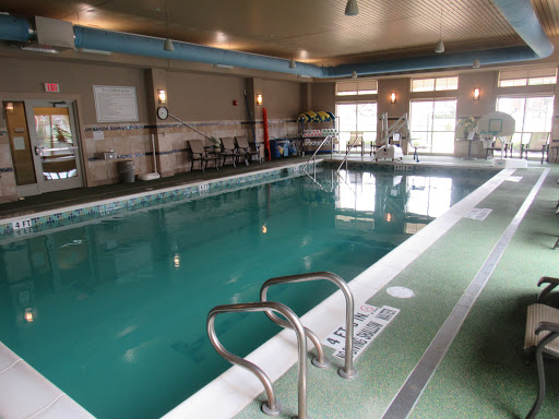 A serene indoor swimming pool, perfect for relaxation and fitness activities.