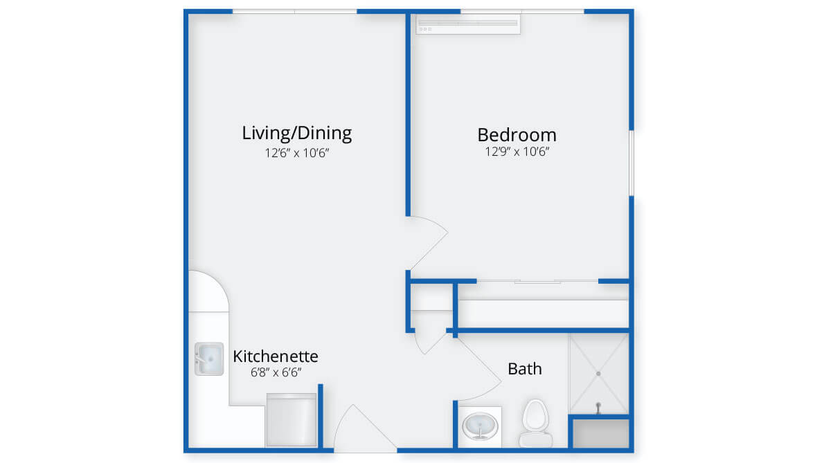 A floor plan of a one-bedroom apartment with designated living/dining area, kitchenette, and bathroom.