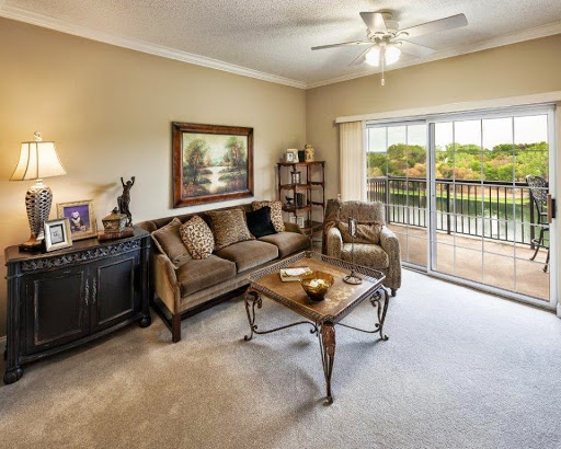 A cozy living room featuring comfortable furniture and a beautiful view.