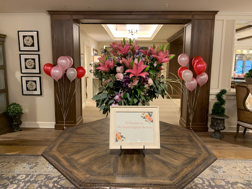 A vibrant display of flowers and balloons, perfect for a celebratory event.