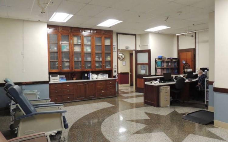 Interior view of a hospital nurse station.