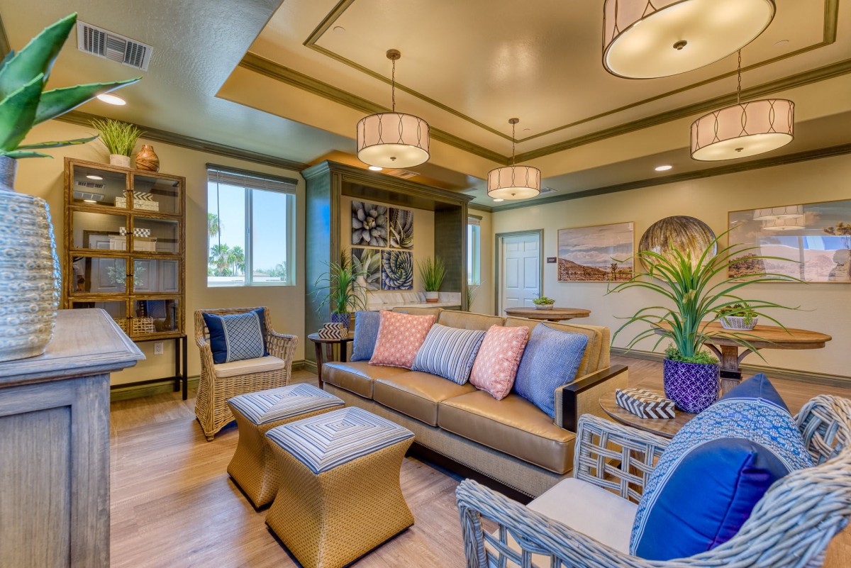 A cozy and modern living room with stylish furniture and warm lighting.