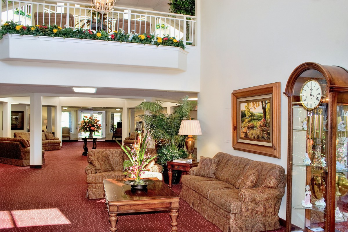 A spacious lobby with comfortable seating and elegant decor.