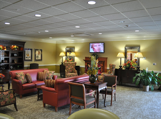 A cozy and inviting lobby area with comfortable seating and warm decor.