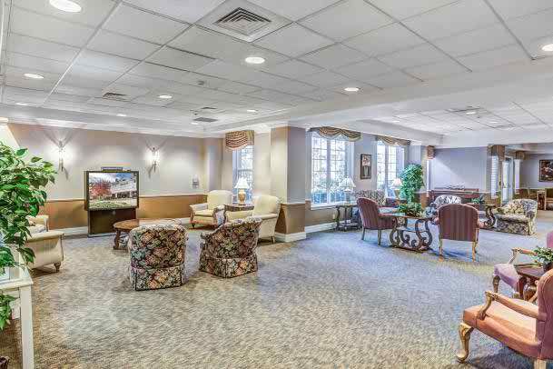 A spacious lobby with comfortable seating and elegant decor.