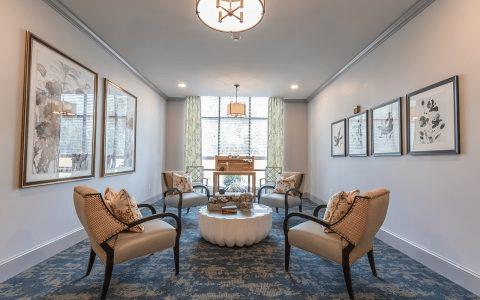 A cozy living room with elegant seating arrangement and decor.