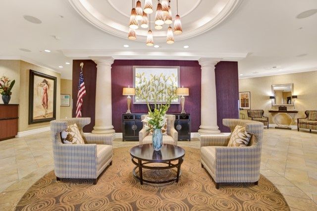 A beautifully decorated hotel lobby with comfortable seating and elegant lighting.