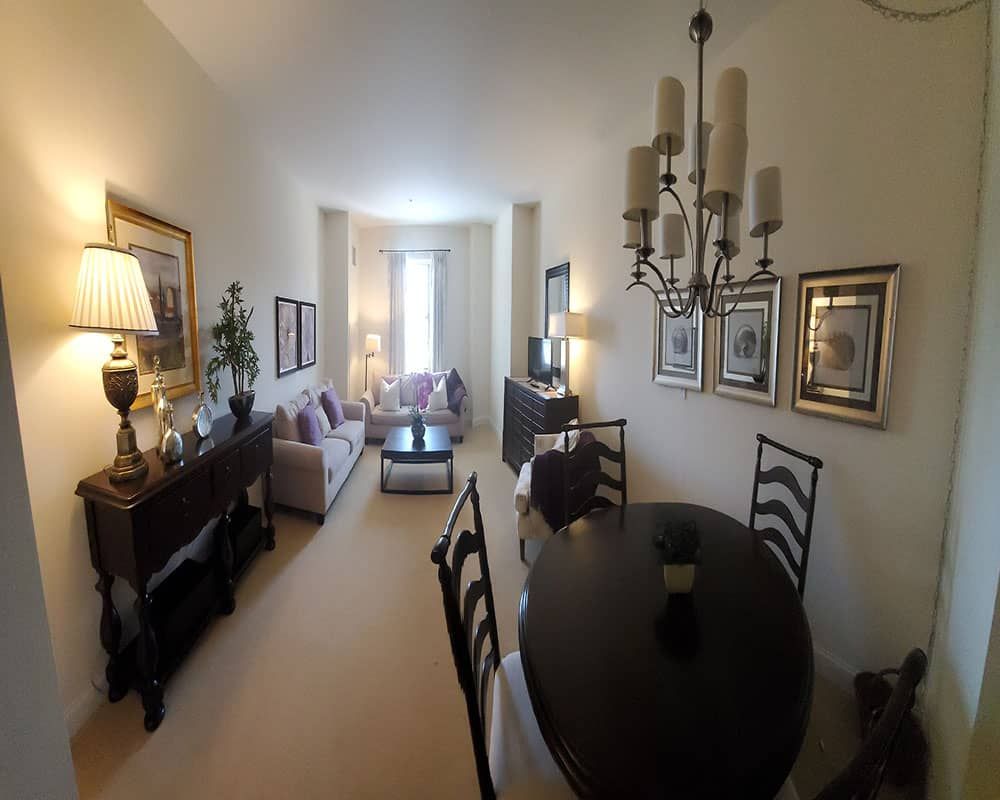 A cozy living and dining space with elegant furnishings and decor.