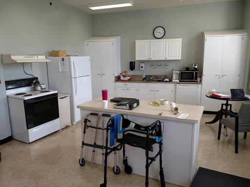 A spacious kitchen featuring modern appliances and a functional layout.