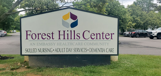 Sign for West Hills Center, a community providing nursing and dementia care services.