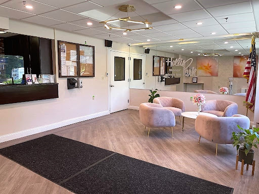 A welcoming and modern waiting area with comfortable seating and stylish decor.