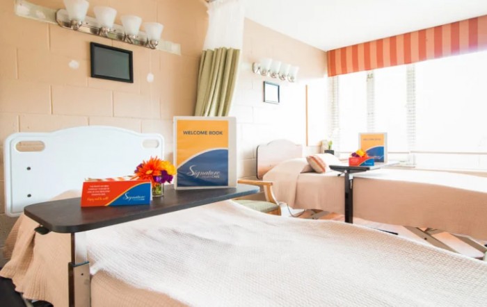 A cozy and modern hotel room with comfortable seating and elegant decor.