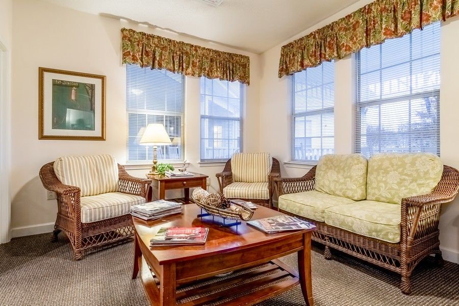 A cozy living room with comfortable seating and natural light.