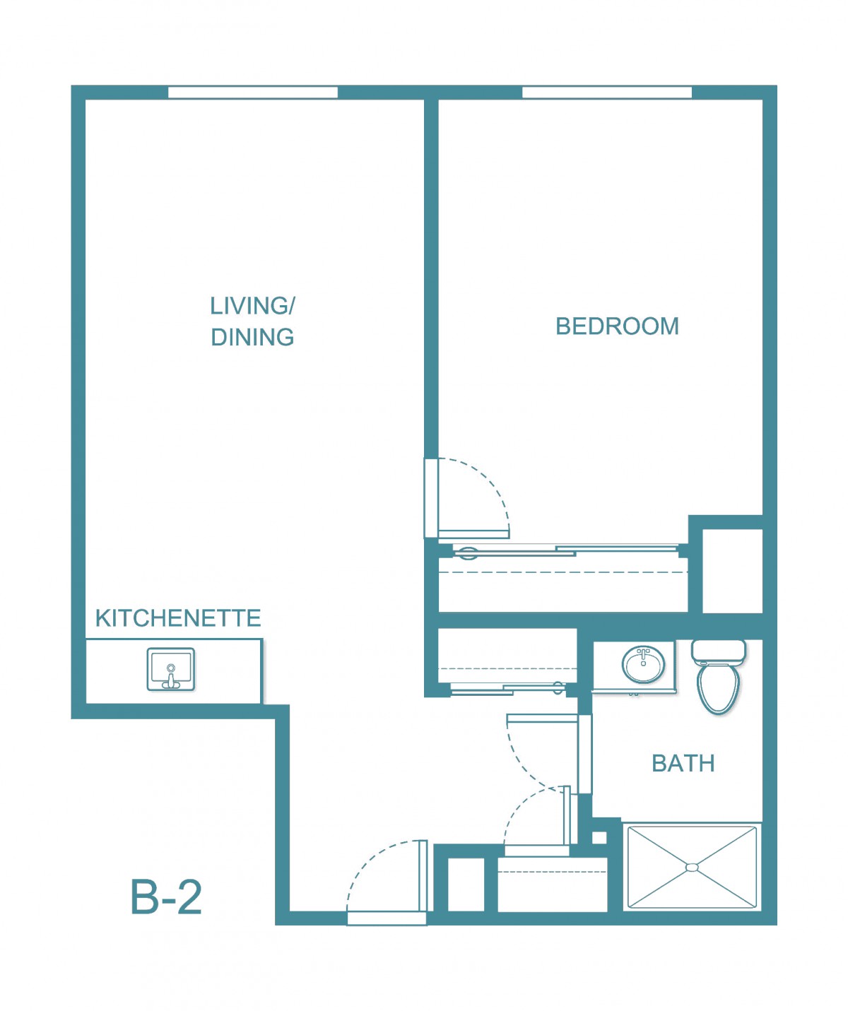 A floor plan of a one-bedroom apartment with a living/dining area, kitchenette, and bathroom.