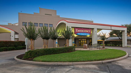 The exterior view of an emergency services building, featuring modern architecture and landscaping.